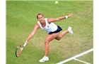 BIRMINGHAM, ENGLAND - JUNE 14: Barbora Zahlavova Strycova of Czech Republic in action against Casey Dellacqua of Australia on day six of the Aegon Classic at Edgbaston Priory Club on June 13, 2014 in Birmingham, England. (Photo by Tom Dulat/Getty Images)